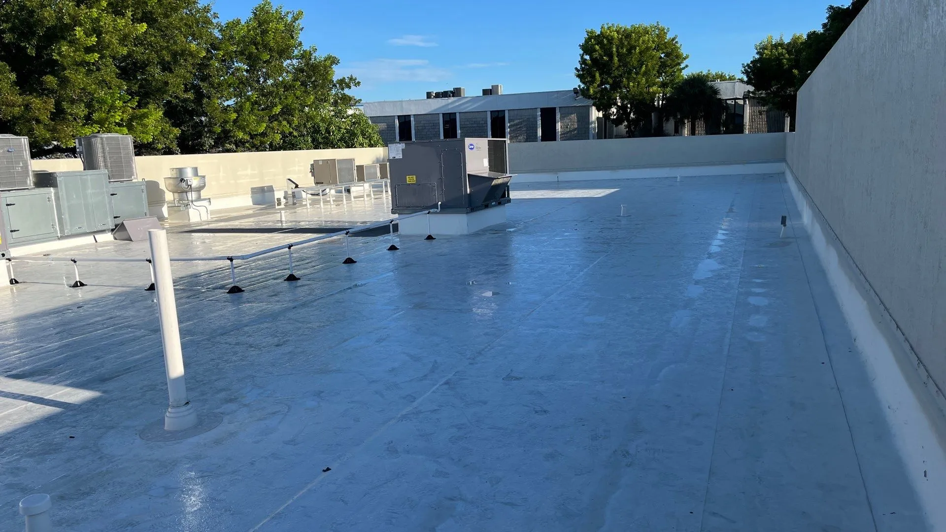 Silicone roof coating application in Royal Palm Beach