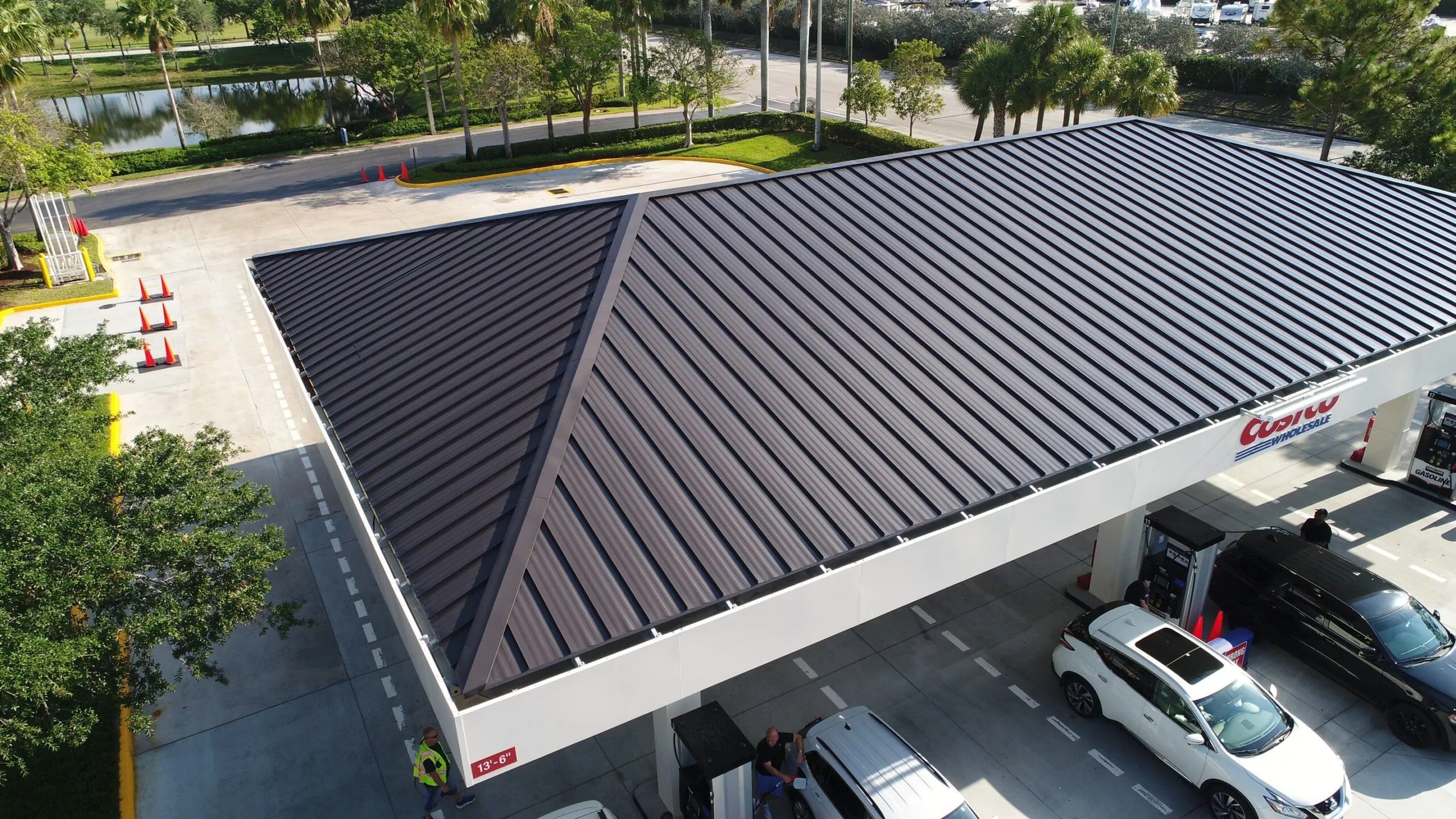 Metal roofing over a commercial fuel canopy