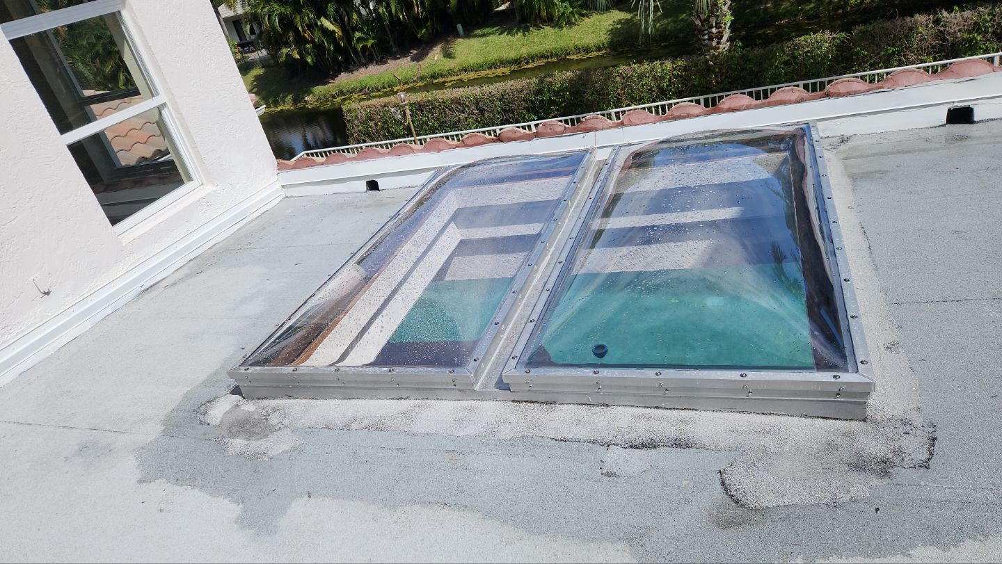 Custom skylight integrated into the finished flat roof