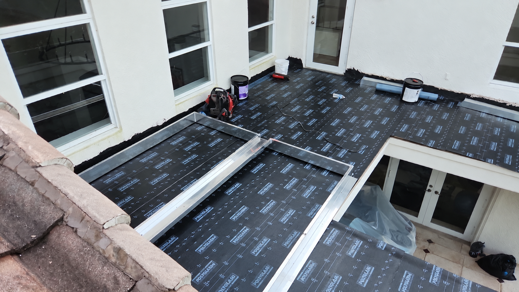 Roofing membrane work around the skylight opening