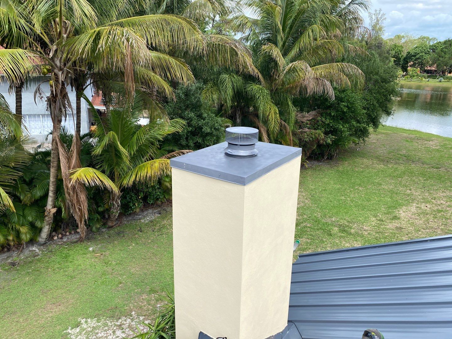 Restored chimney and metal roof flashing