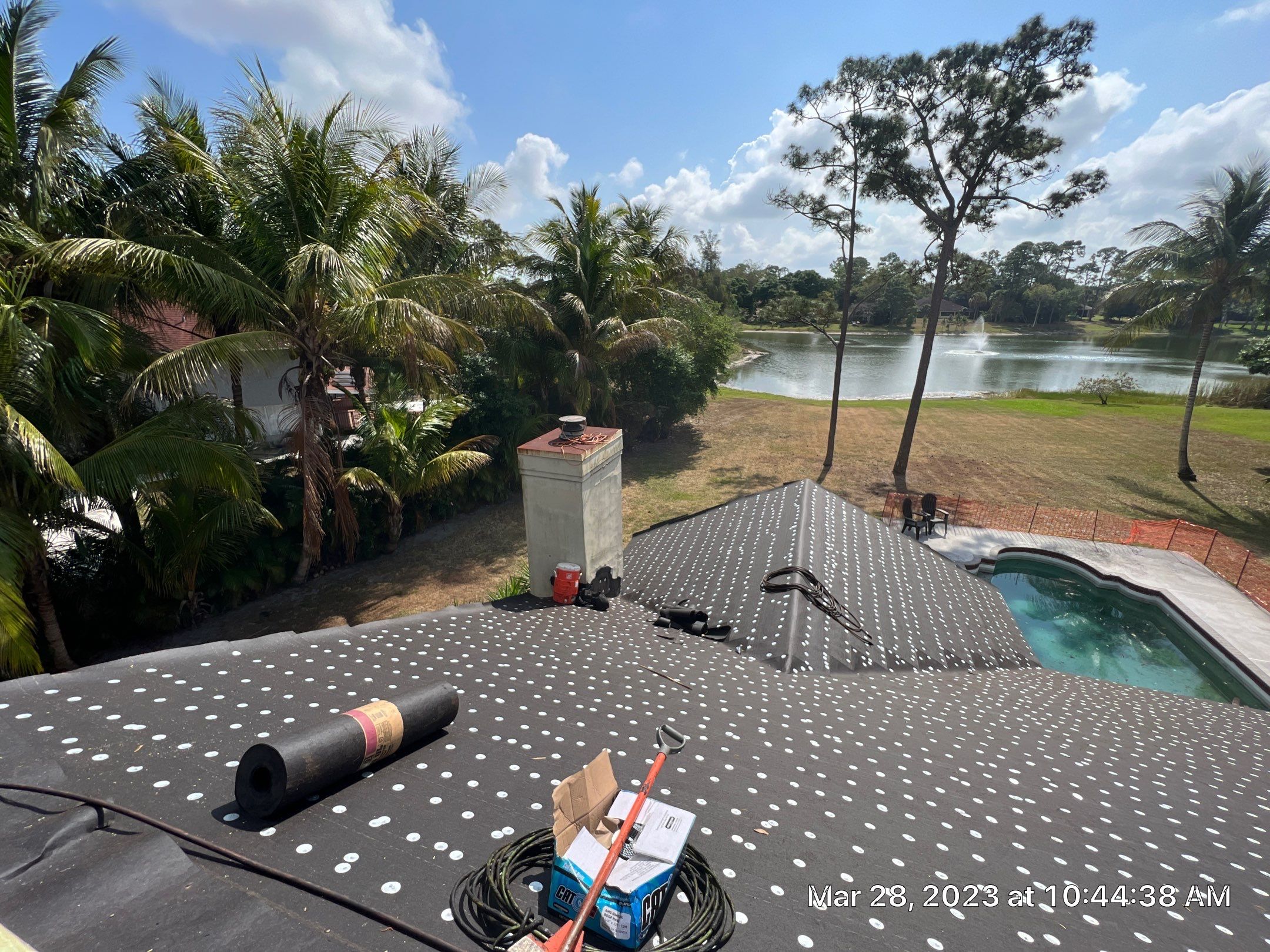 Protected roof deck prepared for metal panels
