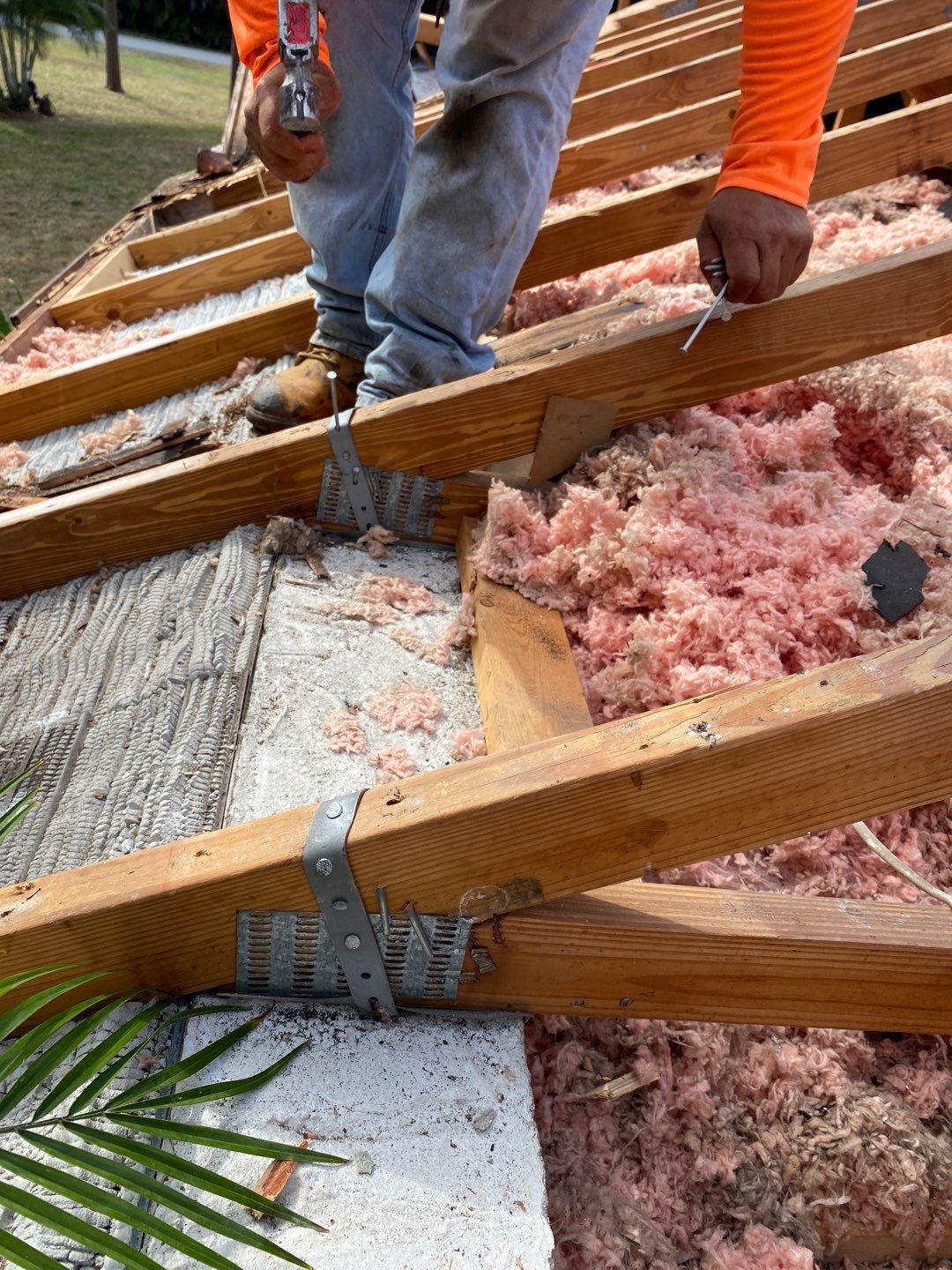 Insulation and framing repairs at the roof deck