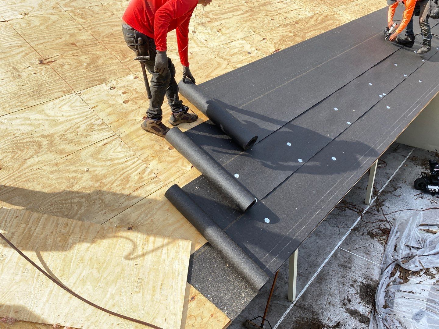 Roof deck underlayment installation
