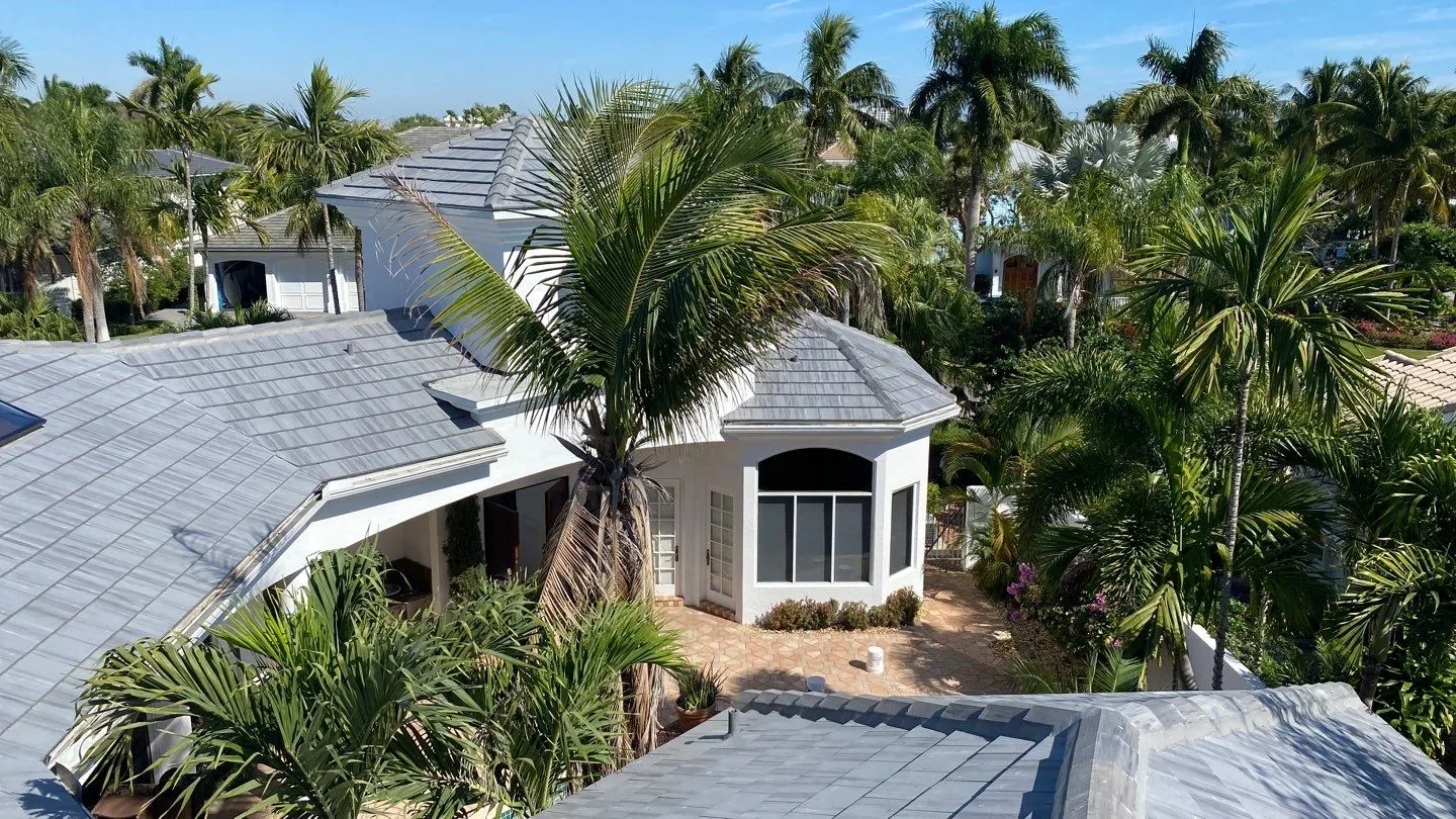 Gray concrete tile roof on a tropical South Florida home