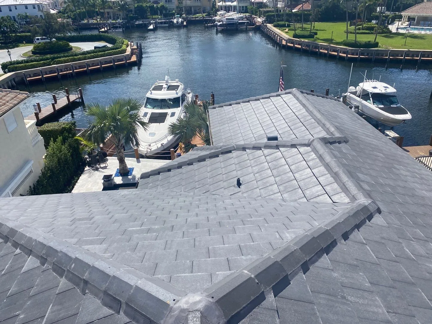 Gray tile roof on a waterfront South Florida home