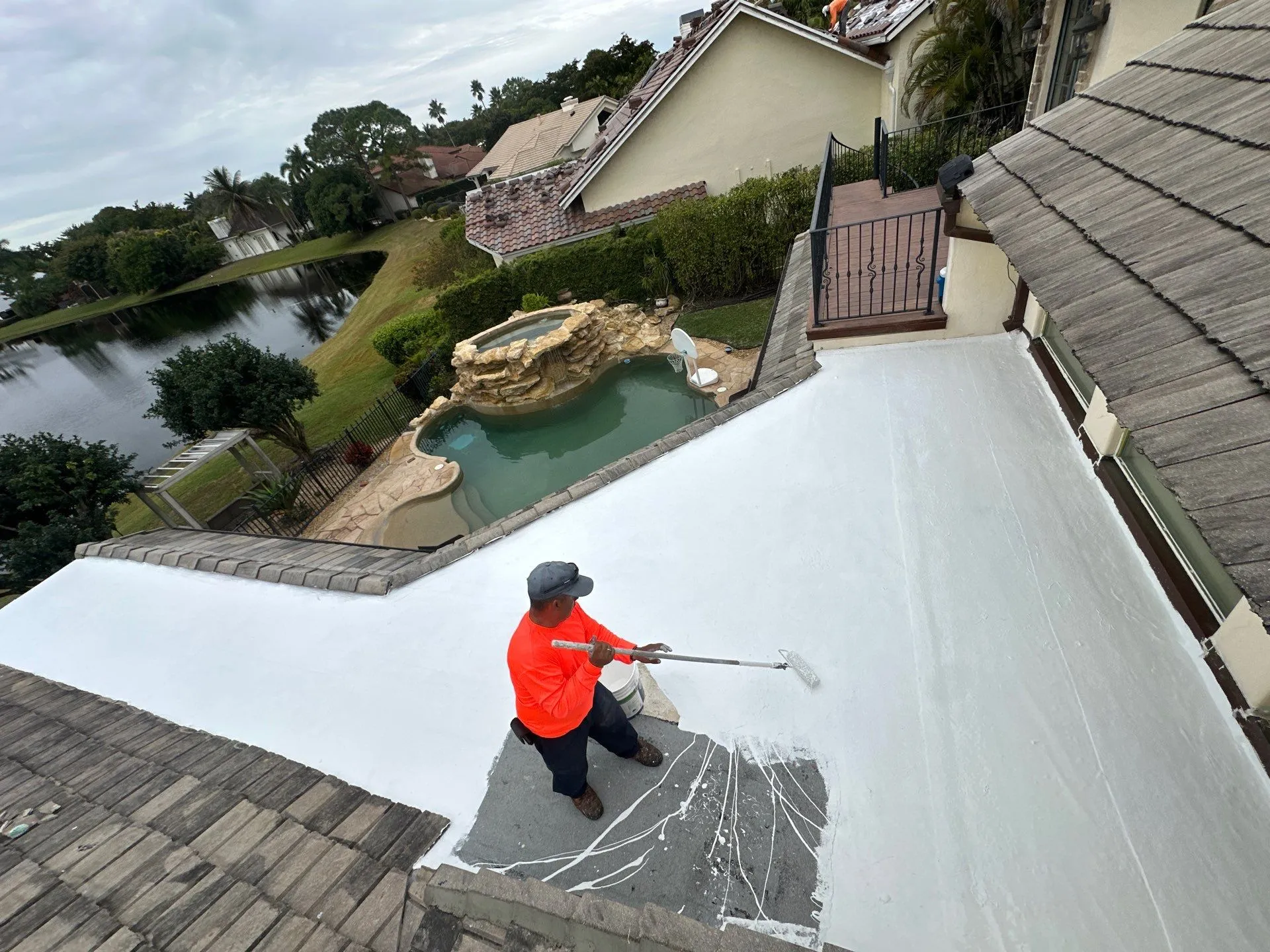 Silicone roof coating system