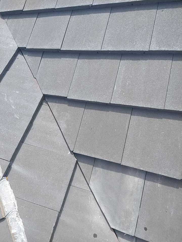 Gray flat-profile tile roof detail in Boca Raton