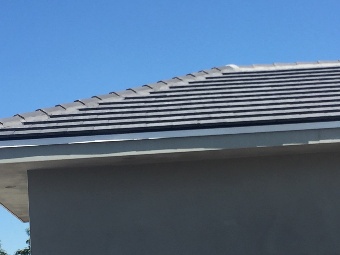 Sloped tile roofing on the Boca Raton new construction home