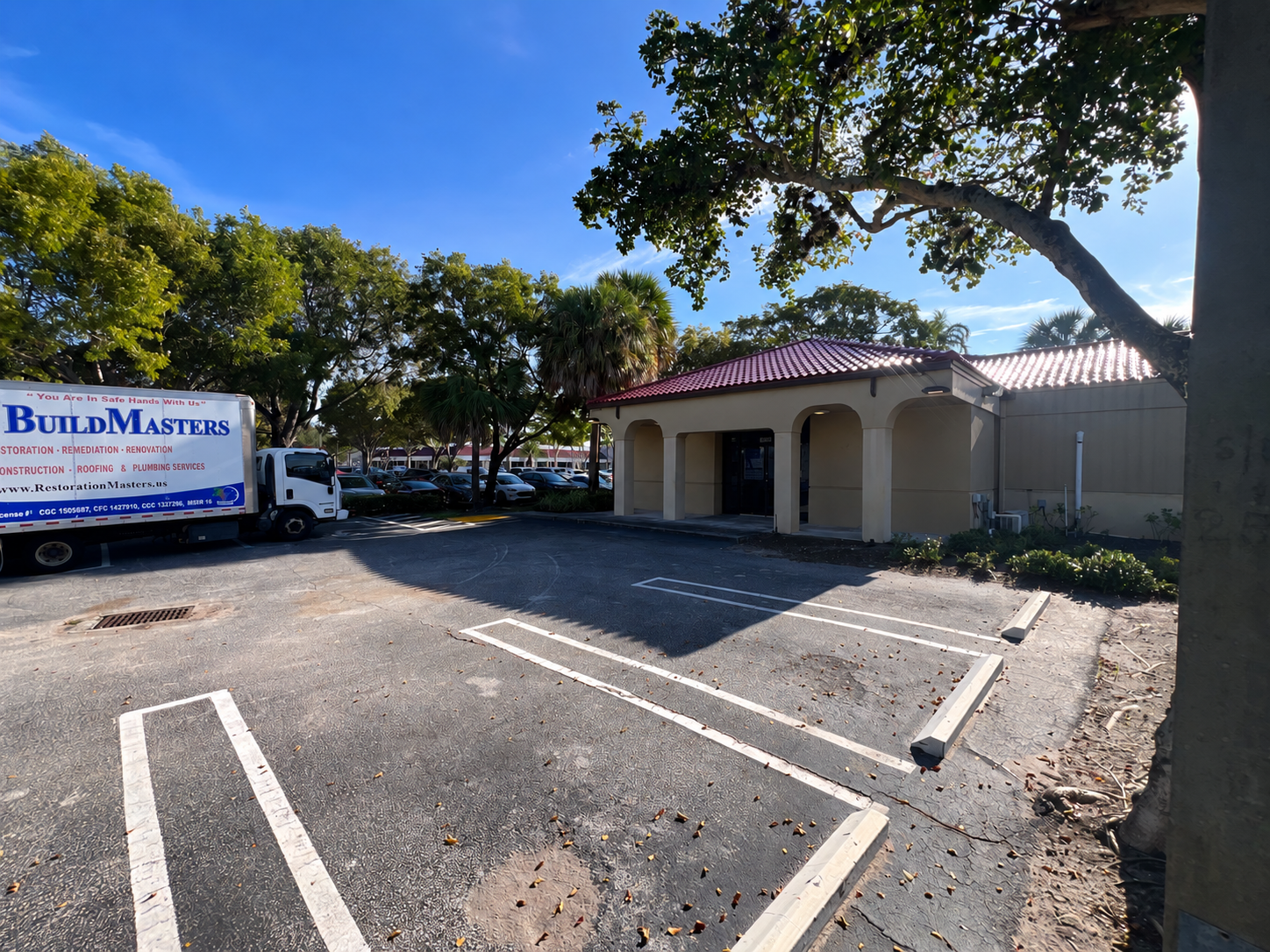 Original red tile roof on the Delray Beach commercial building before replacement