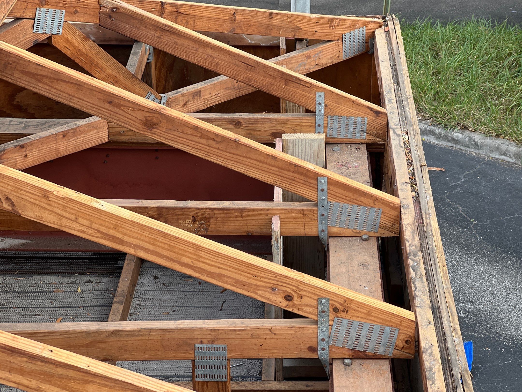 Roof framing and metal connection straps at the Delray Beach commercial property