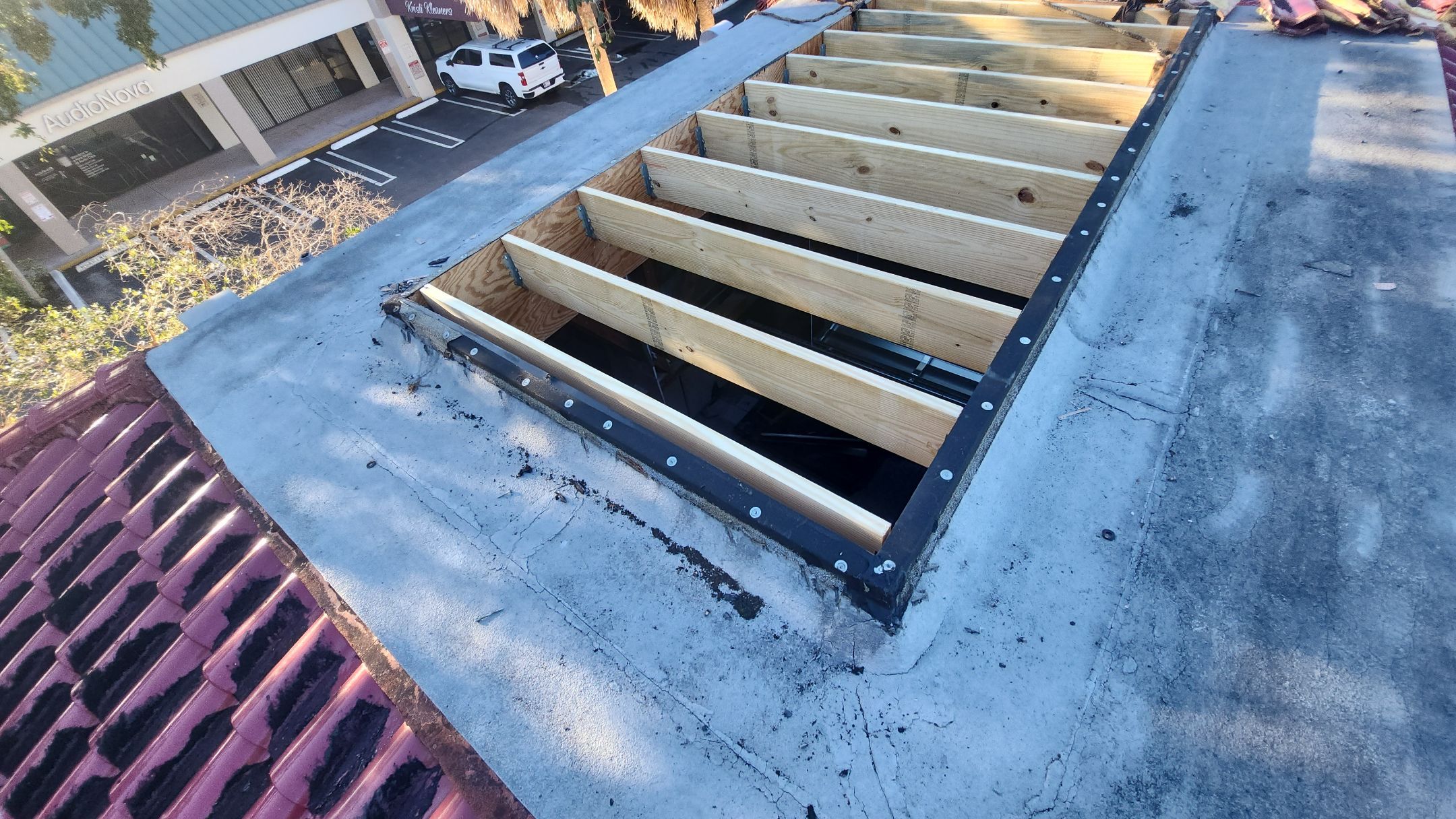 Roof framing preparation at the Delray Beach commercial property